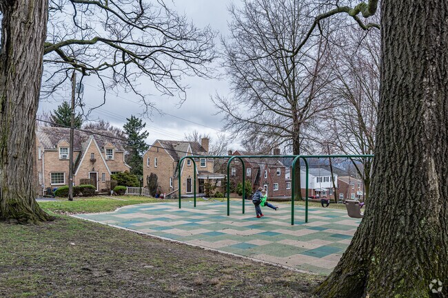 Children enjoy the swing sets in Philips Park in Carrick.