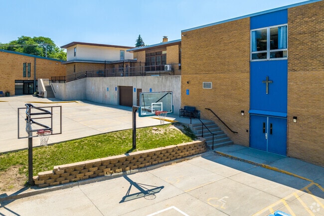Basketball courts and ample outdoor space allow for fun recess time.