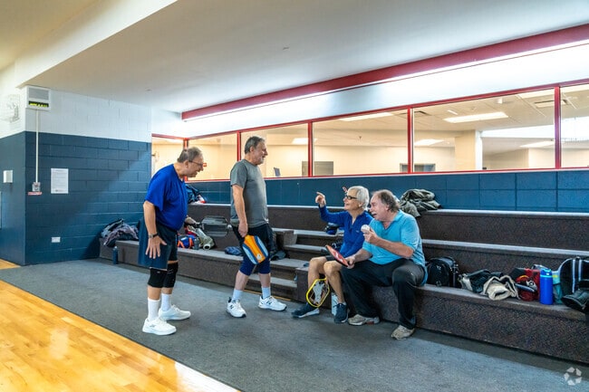 Friends frequently get together to play pickleball at the Heritage Park Sports Complex.