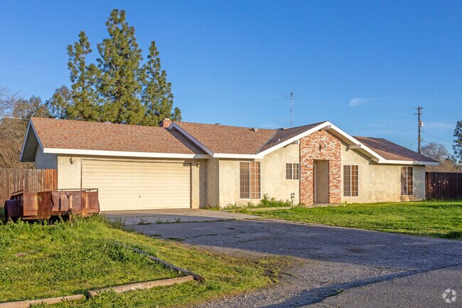 Ranch homes with large yards are common throughout Madera Acres.