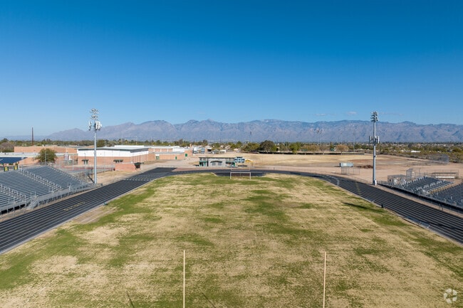 The football field overlooks the Catalina Mountains at Santa Rita High School.