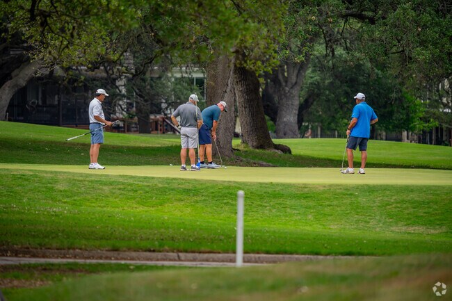 Enjoy the rolling terrain and native oak trees of Fair Oaks Ranch Golf  Club near Northwest Side