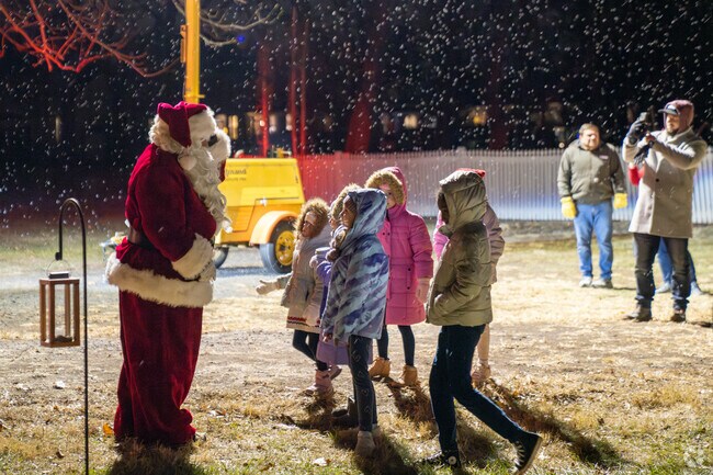 Kids excitedly welcome Santa to Trappe Tree Lighting.