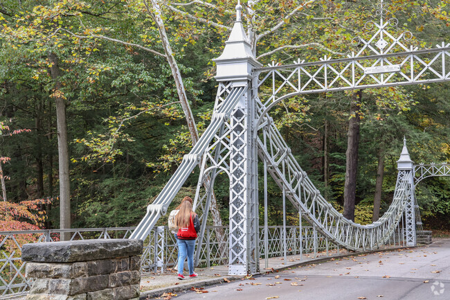This ornate walking bridge spans Mill Creek alongside Idora.