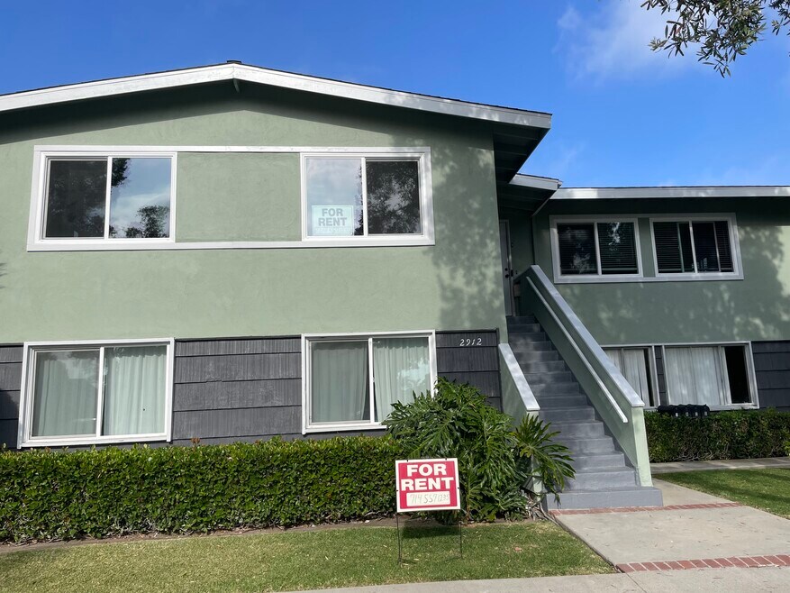 Upstairs unit with new windows; upper left