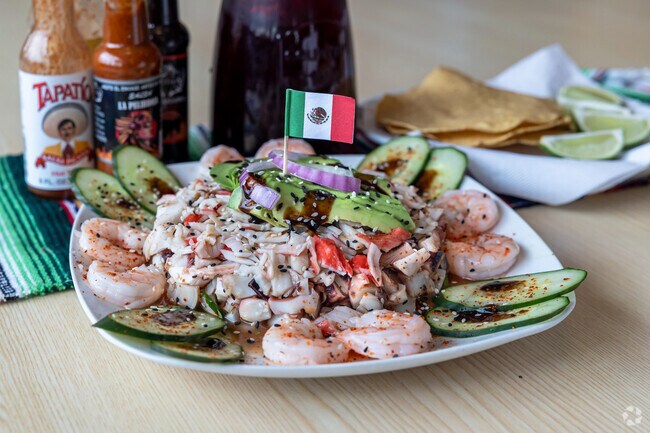 A miniature Mexican flag adds charm to this mouth watering ceviche at Carnitas Michoacan Mexican