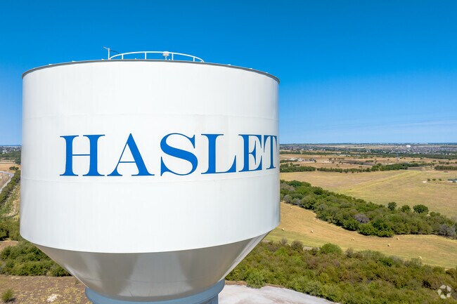 The Haslet water tower stands tall looking over the northern rural section of the neighborhood.