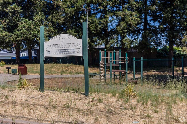 88th Avenue Mini Park is a small, modest park with a playground structure and some green spaces.