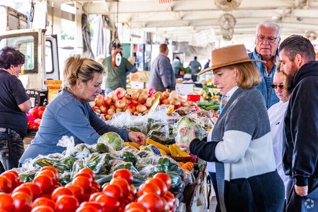 Buying veggies is always popular at  The Market of Marion.