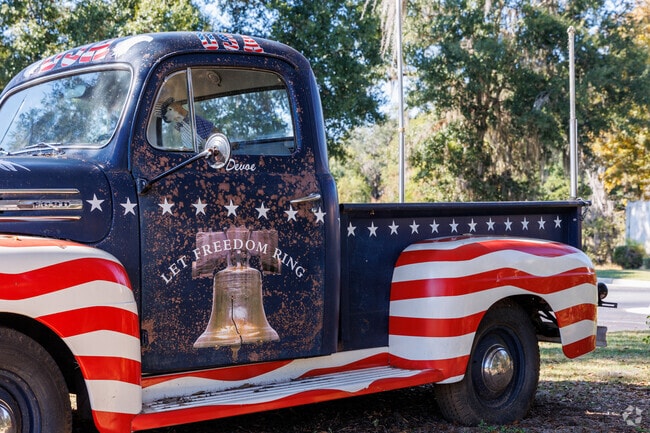 Pride in country and community stands proudly in Buck Lake.