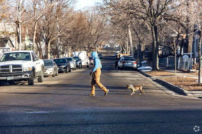 Residents can enjoy quiet strolls along tree-lined streets in the Folwell neighborhood.