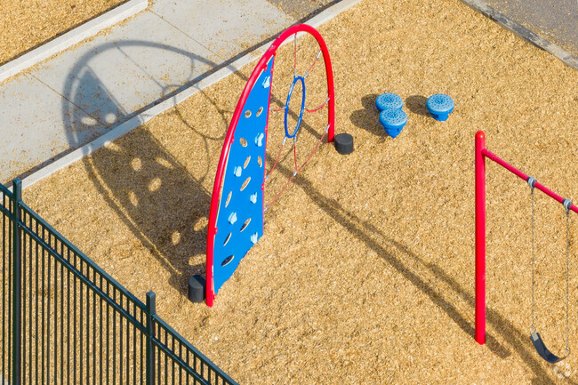 New play equipment at Most Precious Blood in Denver Colorado on a warm winter day.