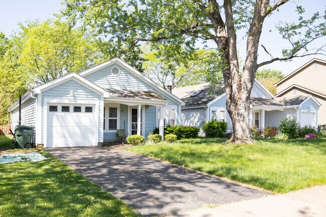 Ranch homes and mature trees line the neighborhoods of Brookside Village.