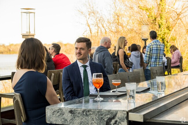 Locals diners in Hopewell enjoy outdoor seating overlooking the Appomattox River.