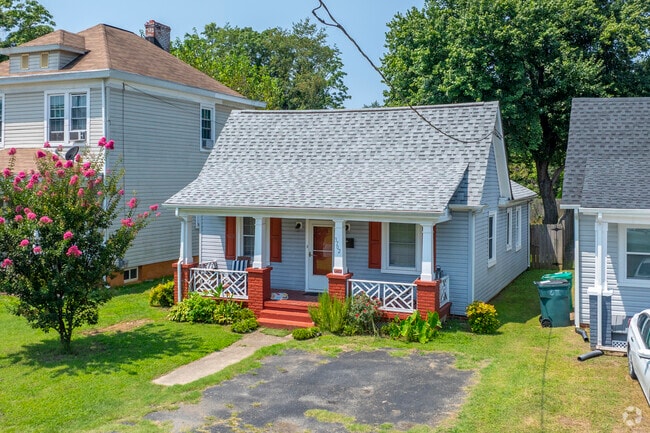 A classic bungalow with red accents on Young St in East Highland Park.