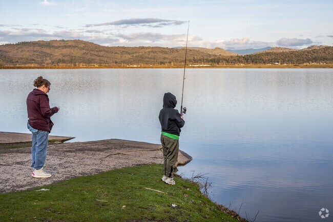 This mom is teaching her son how to fish at Agate Lake reservoir near Eagle Point.
