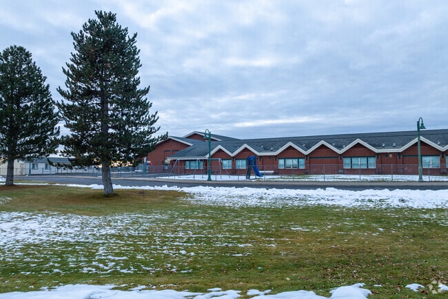 Deer Park Elementary features a small parking lot beside the school.