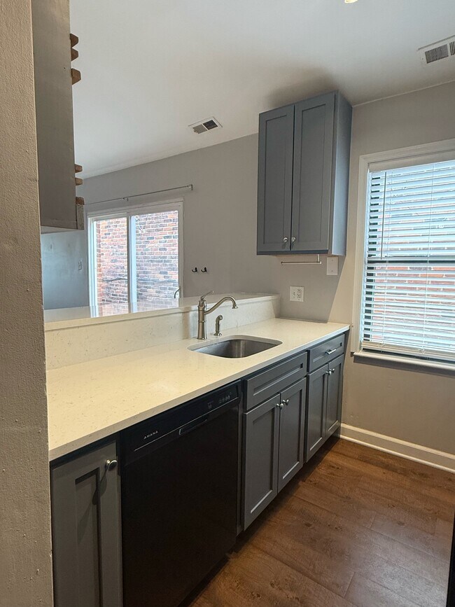 Kitchen with Quartz Counters Throughout