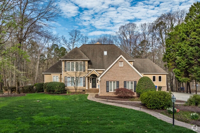 Custom-built homes in The Oaks are situated on large wooded lots.