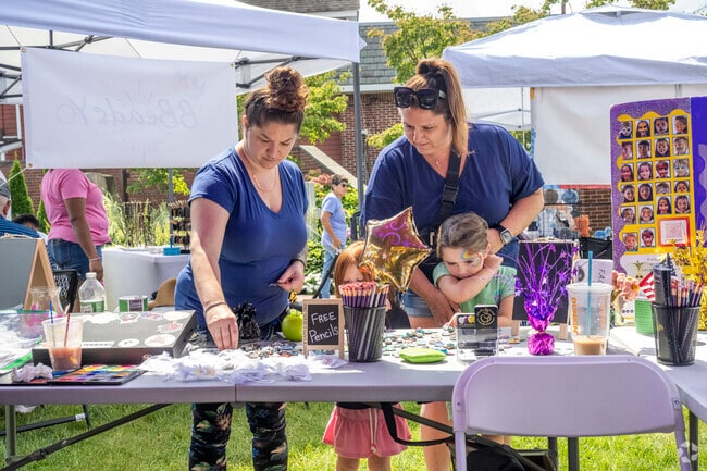 Get your face painted or pick out fancy jewelry at the Craft and Gift Fair On The Village Green.