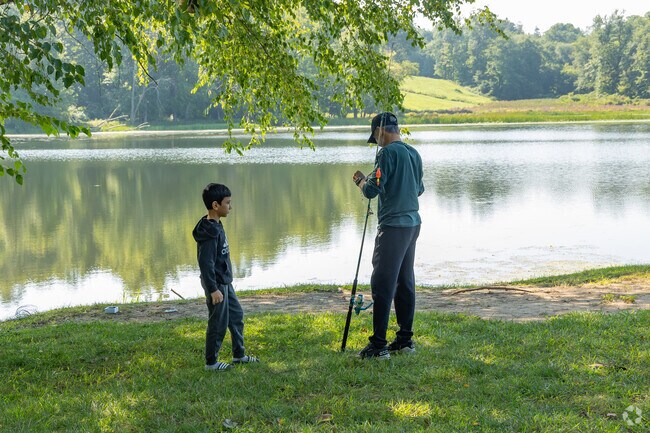 Saugerties Village Beach is a popular spot for dads teaching their children to fish.