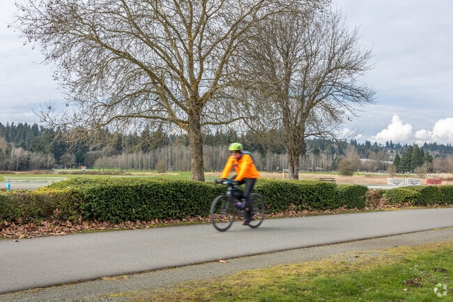 People enjoy scenic bike rides along one of Sahalee's many winding streets.