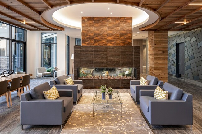 Cozy up by the fireplace in the Entertainment Lounge