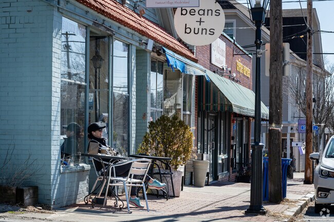 Nice outdoor street sitting to enjoy your day in Broad St. located in Edgewood, Cranston.