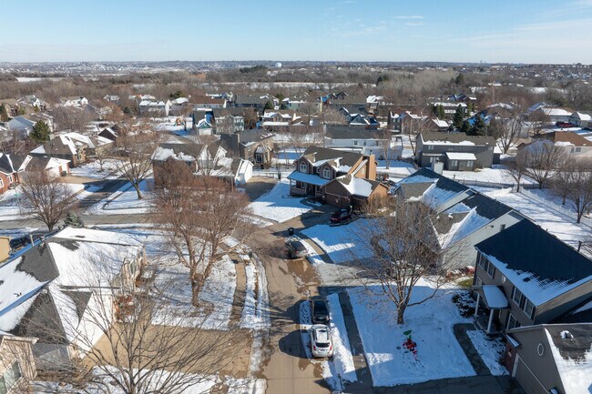Shady lots and sidewalk-lined streets define Standing Bear’s residential charm.