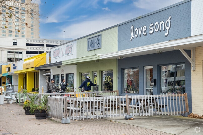 Shoppers explore a row of local boutiques in the North Virginia Beach neighborhood.