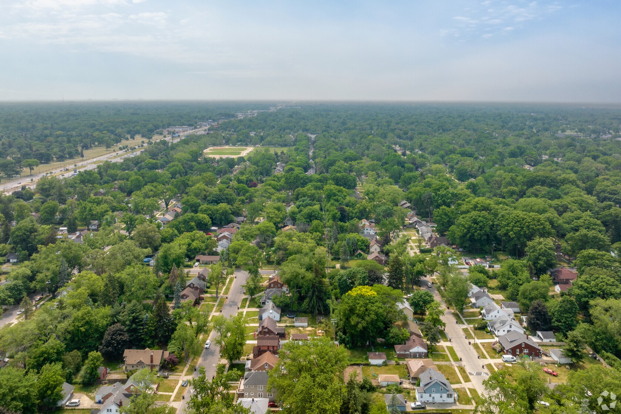 Aerial View of The Eye Neighborhood showing the lush tree cover.