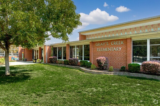 Gray's Creek Elementary has a large outdoor play area in Grays Creek.