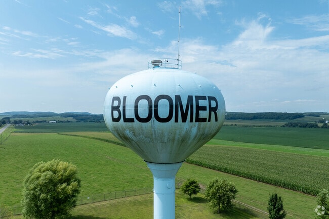 The Bloomer water tower stands as a local landmark near Main Street.
