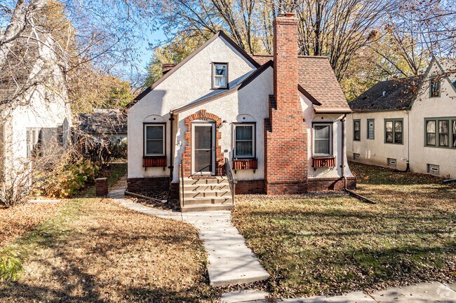 Many homes in Victory feature steeply pitched roofs and exterior stonework.