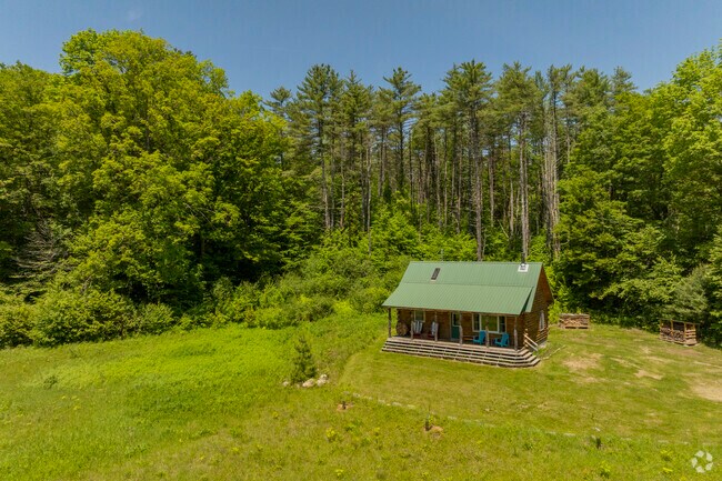 Log cabins in Brookline offer rustic charm, natural materials, and cozy living surrounded by forests and mountain views.