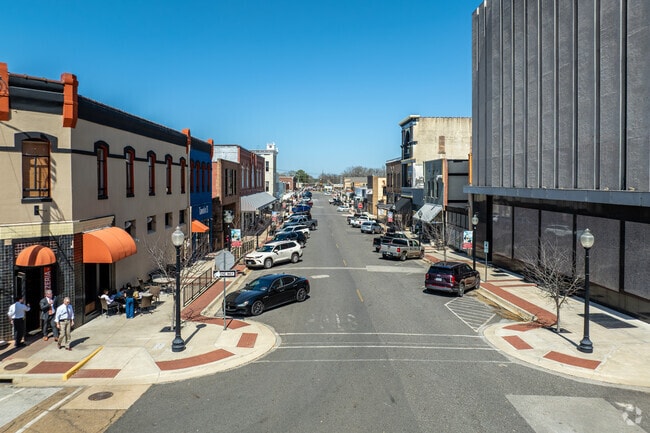 Stroll through the charming streets of downtown Marshall, Texas, where local boutiques, community events, and vibrant support for small businesses create a welcoming atmosphere.