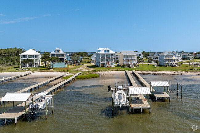 Many of the seaside homes on Harkers Island have long docks due to the sea level change.
