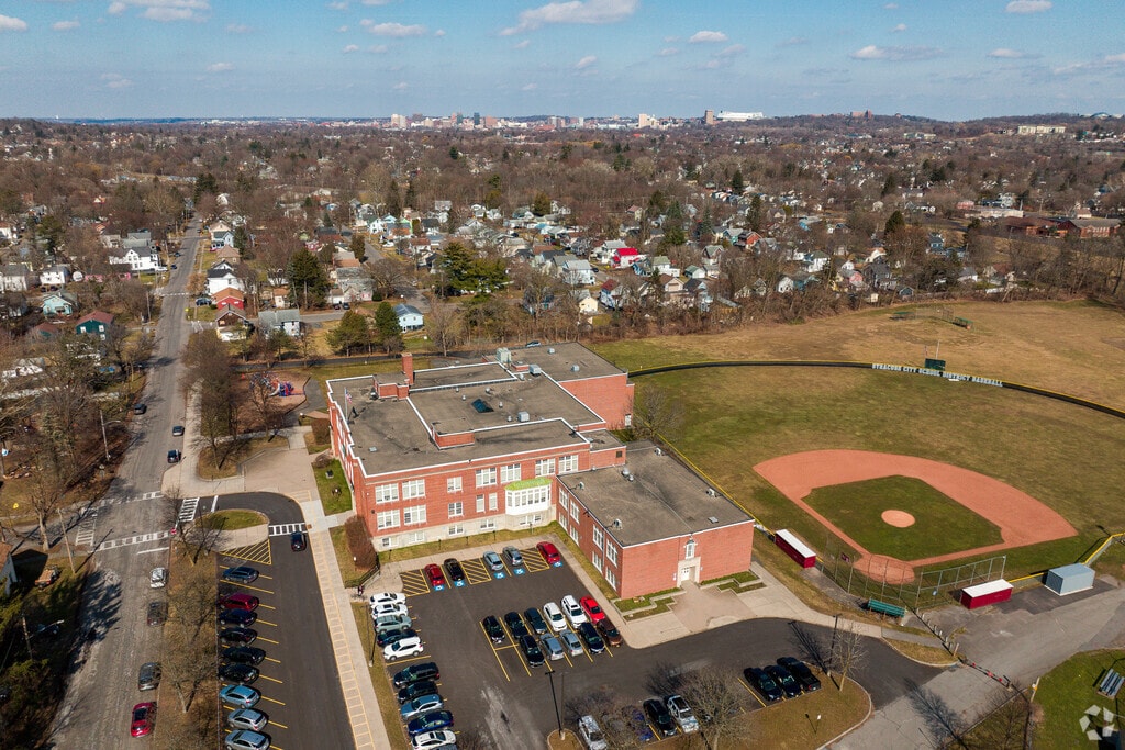 The city of Syracuse skyline can be seen behind Van Duyn Elementary in the Valley.