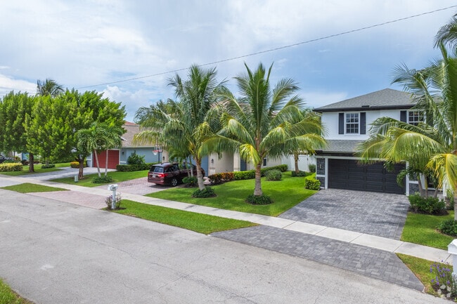 Marvel at Downtown Delray row of large state homes, perfect for spacious living.