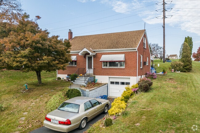 Embrace timeless elegance with this Cape Cod house in Ontelaunee, PA.