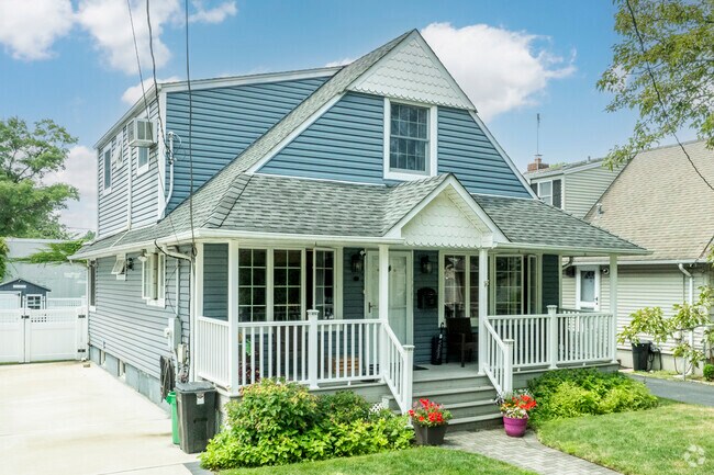 Contemporary architecture often accent many Cape Cod style homes in North New Hyde Park.