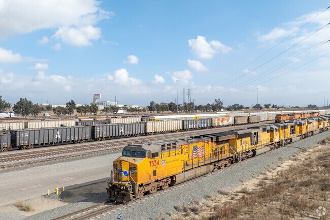 Some emissions are produced by the warehouses and locomotives in the Rialto area.