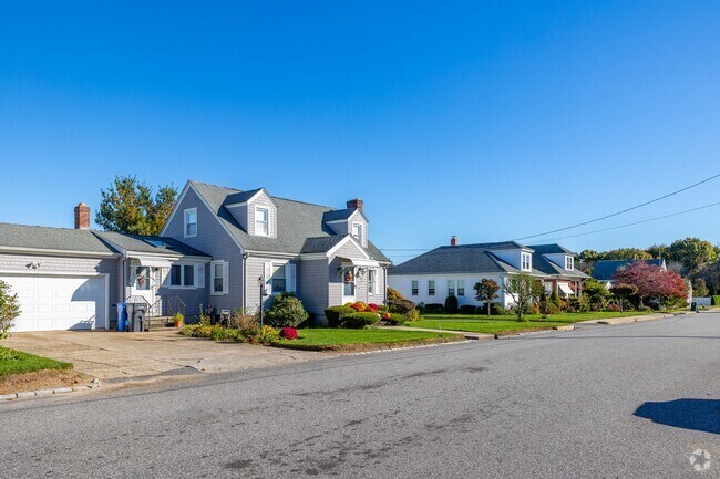 A blend of Cape Cod and other architectural styles defines Knightsville’s neighborhood charm.