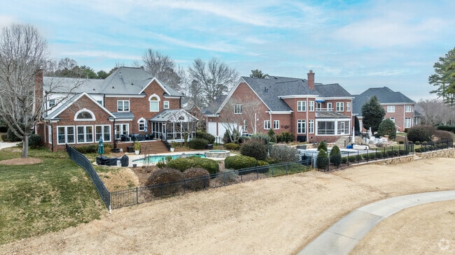 A row of large brick homes in Davidson, North Carolina.