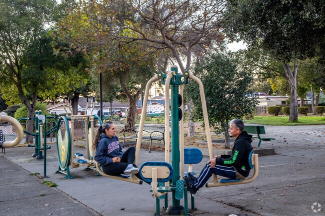 People often work out at the outdoor gym at John F . Kennedy Park.