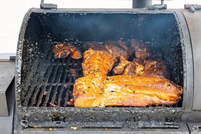 The chef of Flamingo Seafood Restaurant smokes fresh fish every day in Santa Barbara Estates.