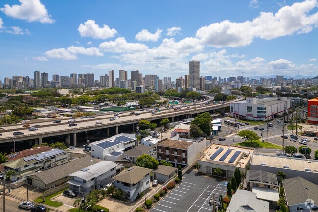 The neighborhood is conveniently located just a short drive from the bustling areas of Honolulu.