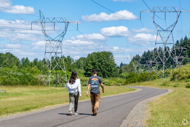 Burnt Bridge Creek residents enjoy scenic walking paths throughout the area.