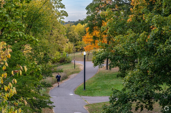 Randall Park residents enjoy the winding paths through Owen Park.