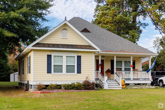Acadian-style home with classic porch adds character to Saints Streets.